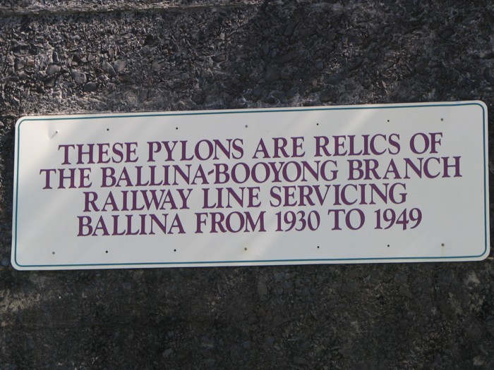 A commemorative plaque on pylons over North Creek Canal.