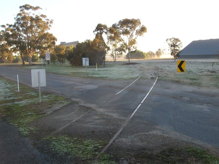 Rails in the road - looking west across Jerilderie Street.