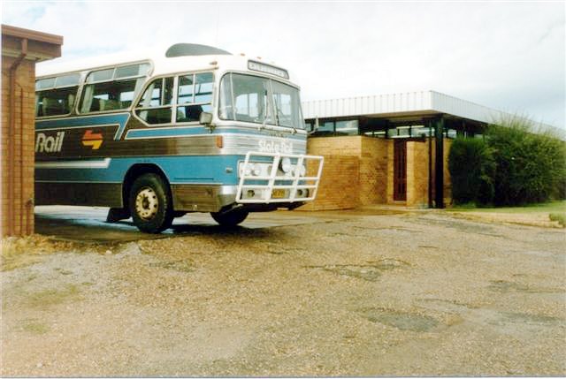 The State Rail bus to Dubbo is parked on the platform at the station.