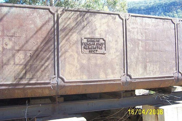 The makers plate on the side of the Up side water tank.