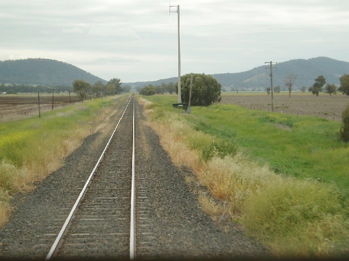 The view looking towards Werris Creek. The tall pole on the right is a CountryNet Radio Antenna.