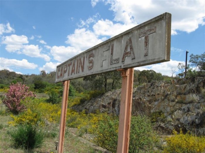 The station name board is still present on the platform.