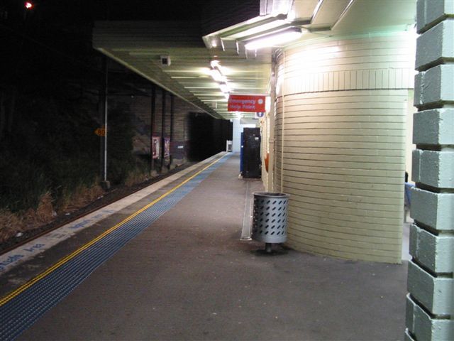 
A night shot looking along the platform towards Central.  The tunnel
mouth ahead is the bridge where The Kingsway crosses the line.
