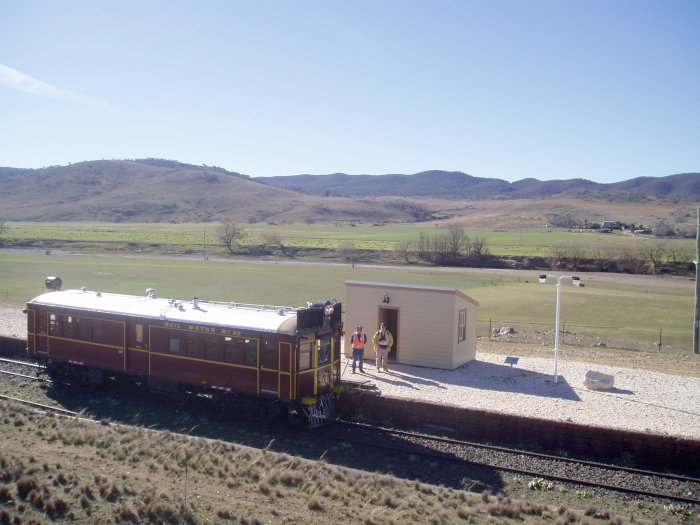 Preserved rail motor CPH 22 stopped at Chakola. The station now sports a restored shelter.