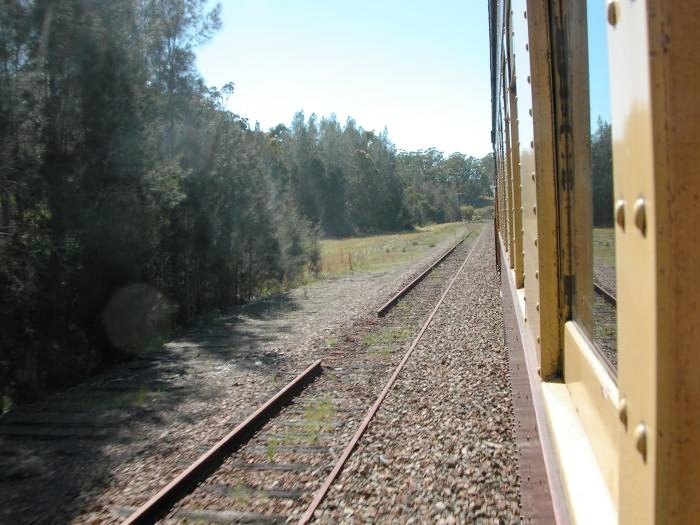 The former loop siding, clearly no longer in use.  On the left of that was the now-lifted goods siding. The station was situated on the far side of the train.