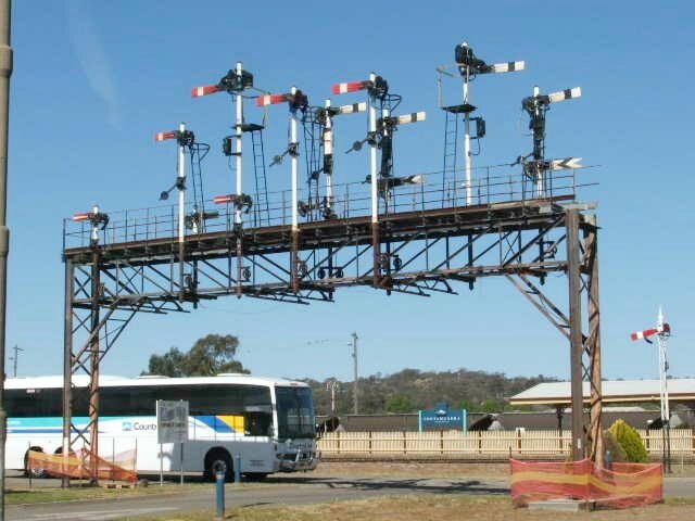 The old overhead signal gantry now has been moved to form an archway for buses entering the railway complex near the Arts Centre and Heritage Centre buildings.