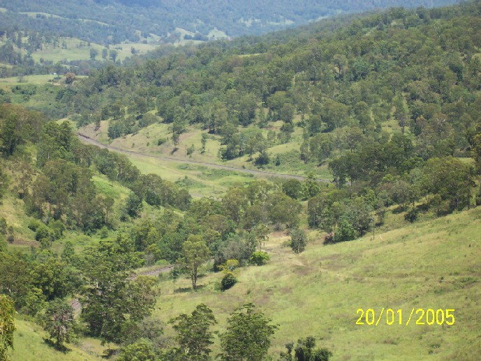 
In the distance is the line approaching from the south, while in the foreground
is the same line which has curved around and is about to enter No 2 tunnel.
