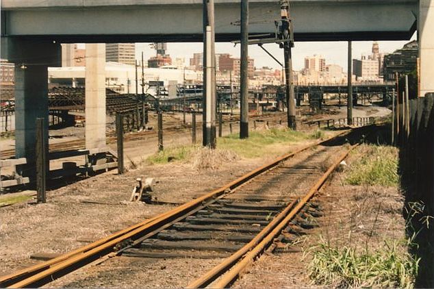 
The view looking south from the western side of the yard.  Demolition of
some of the sheds appears to be in progress.
