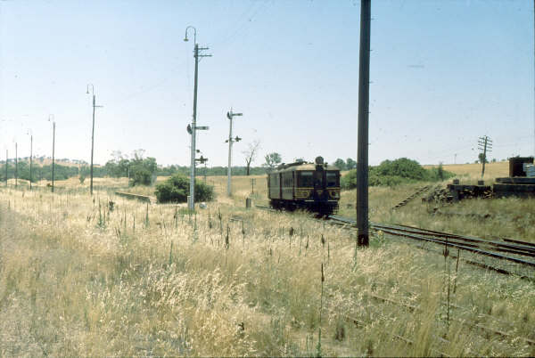 CHP38 comes off the Blayney Branch and trundles north through the old branch platform at Demondrille.