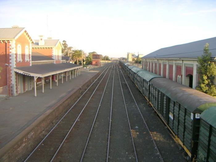 
The view looking south.  In the distance are the elevated water tank on
the left, and the rice mill on the right.
