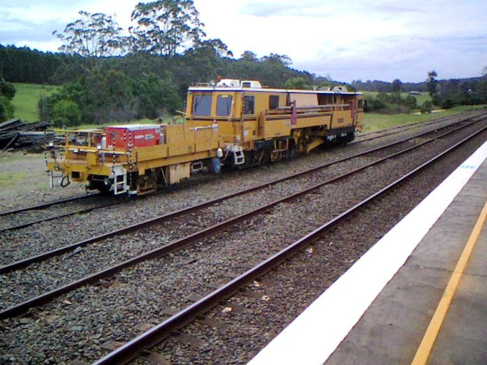 A track tamper store in the siding at Eungai.