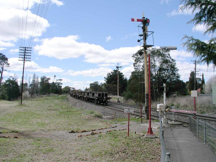 
The sempahore signal at the up end of the station is standing at danger,
as a train has just passed through.
