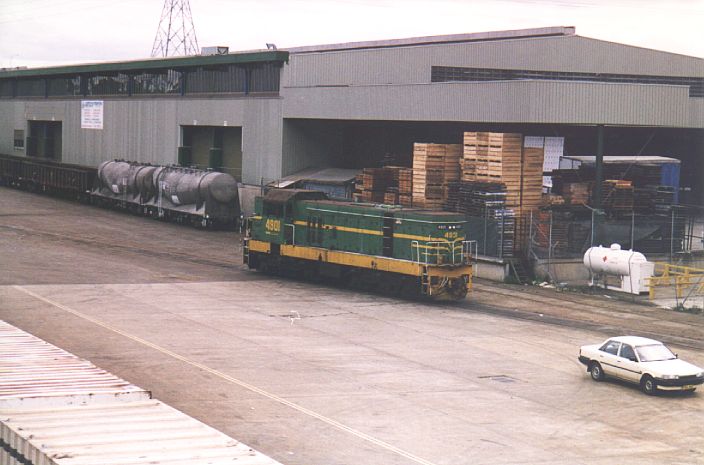 
Green-and-gold 4901 sits shut down in Flemington Goods Yard.
