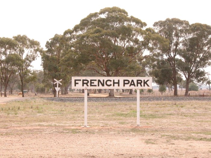 The station nameboard survives, but has been turned around to face away from the line.