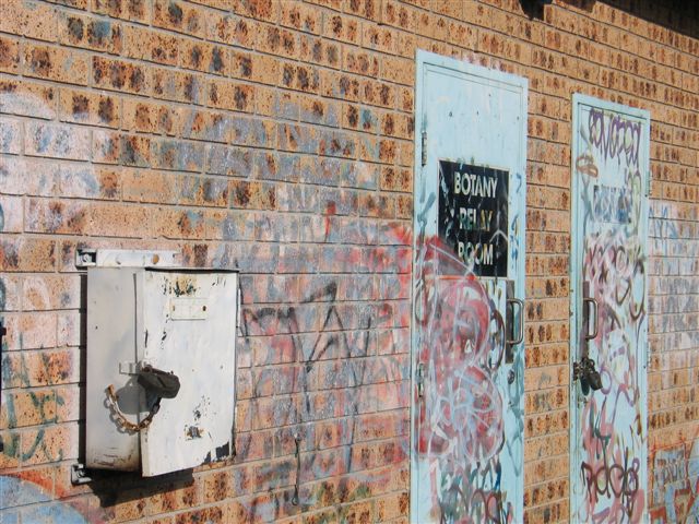 
A close-up of the well-graffittied Botany relay room.
