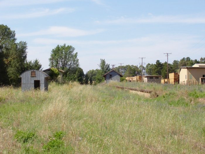 The view looking towards Tumut. The buildings from left to right are the toilets, station and goods shed.