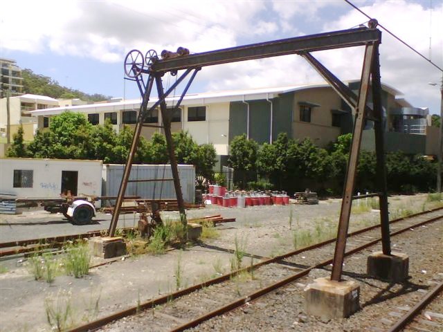 The gantry crane is still present in the yard.