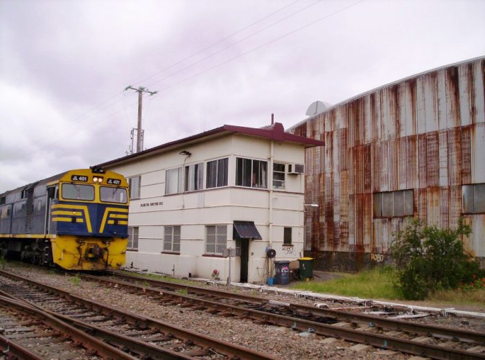 JL401 is passing the signal box.