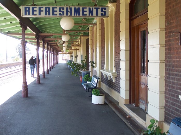 The view looking along the platform, showing the preserved signage.