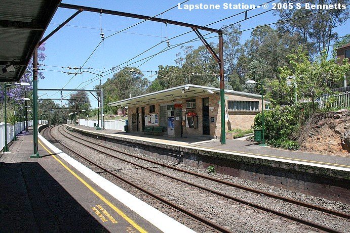 The view from platform 2 looking in a down (southerly) direction, showing platform 1 and the station building.