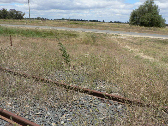 The foundations of a lever frame in the grass.