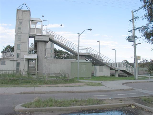 
The stark footbridge and lifts serving the comparatively new station of
Metford.
