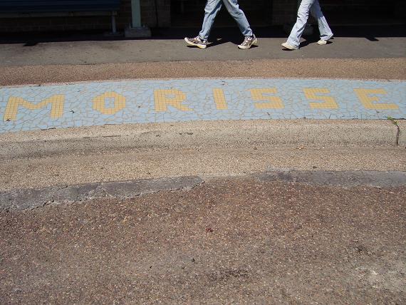 A closer view of the station name mosaic.