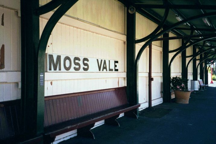 
The station name-board under the shelter on the down platform.
