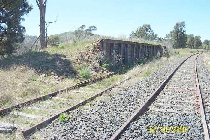 There is just a Loading dock on the Up side of the line. There is no sign of any platform.