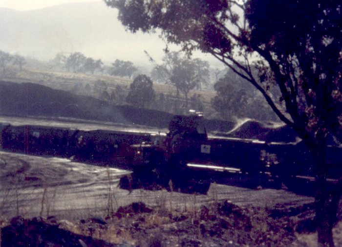 Loading operations being performed by a front end loader.