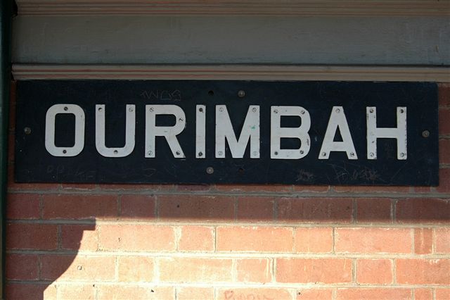 A close-up of the station sign on platform 1.