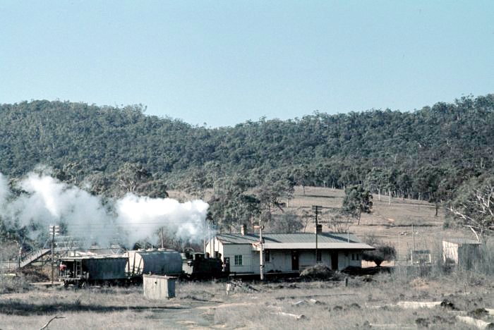 Portland station viewed from the town direction. A loaded train from the cement factory is arriving at the station.