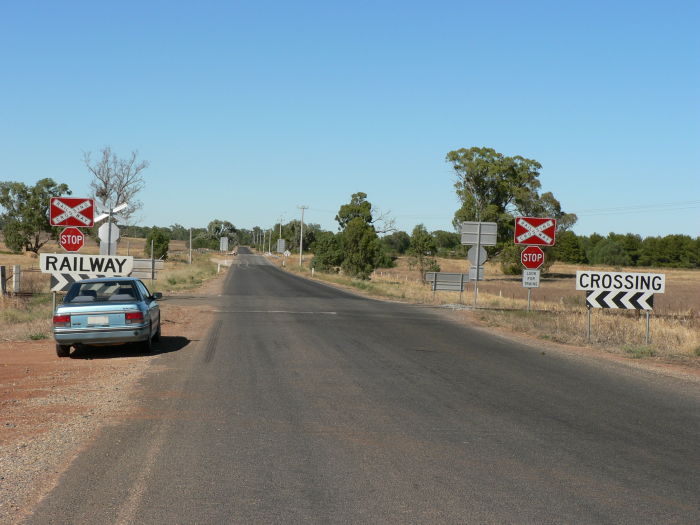 The level crossing adjacent to the one-time location.