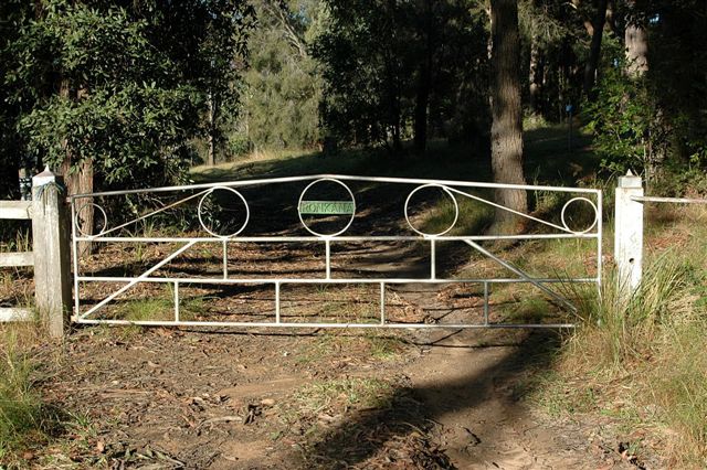 The gate outside of Ronkana Cemetery, the only sign left of the one time station at the nearby main line.