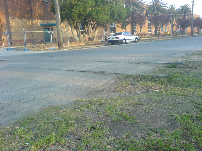 The view of the Shirley Street crossing, about halfway along the siding.