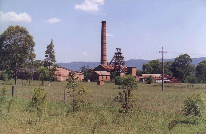 
The view from the road shows a number of surviving buildings.
