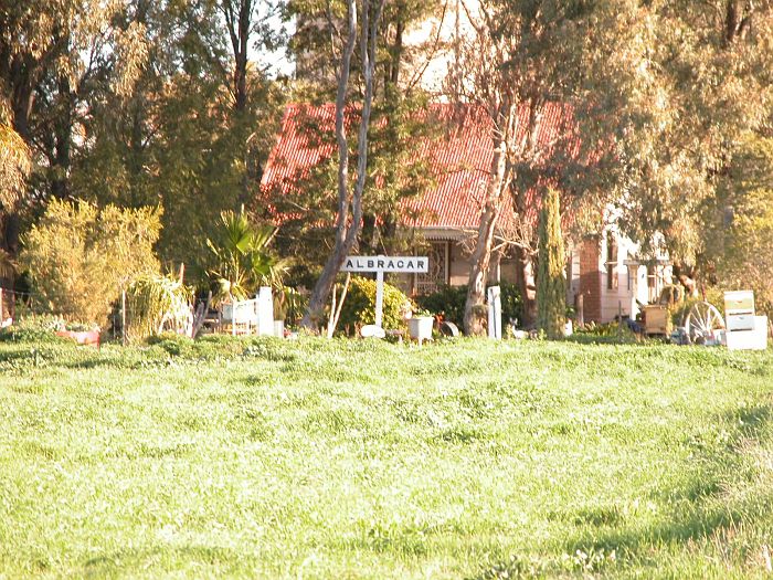 
The adjacent property, possibly an ex-railway residence, now sports the
station nameboard.
