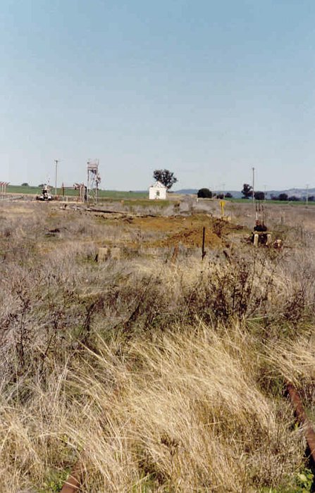 The area has been disturbed by non-railway activities, but the shelter and lever frame can be seen in the view looking south.