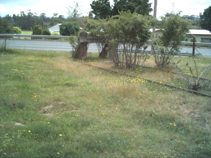 The buffer stop remains on the edge of the main road, at the end of the line.