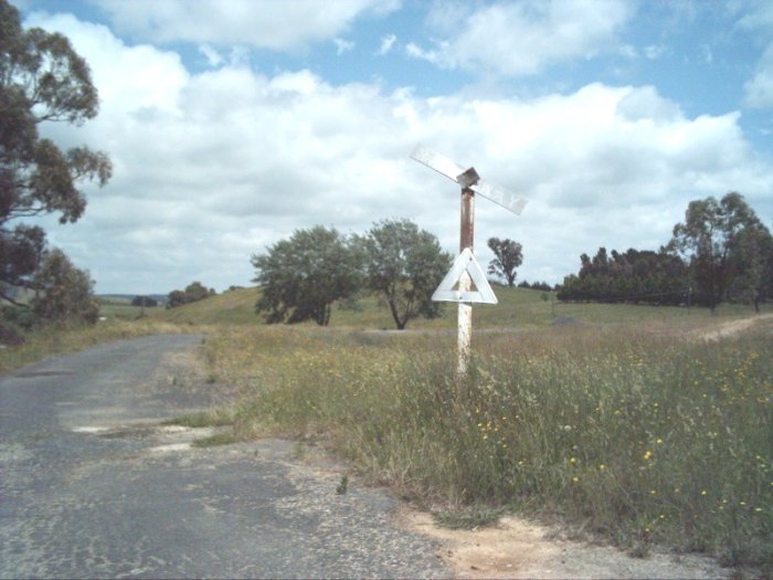 A decrepit level crossing warning sign just out of Tumbarumba.