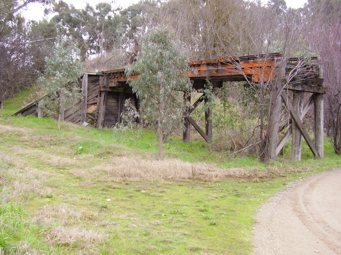 The western abutment of the bridge showing the timber retaining wall.