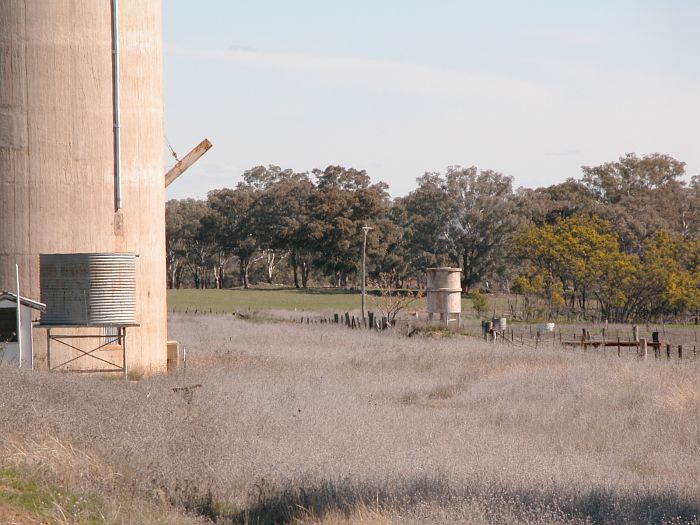 
Only a water-tank remains of the one-time station.  Behind the silo is the
goods loading platform.
