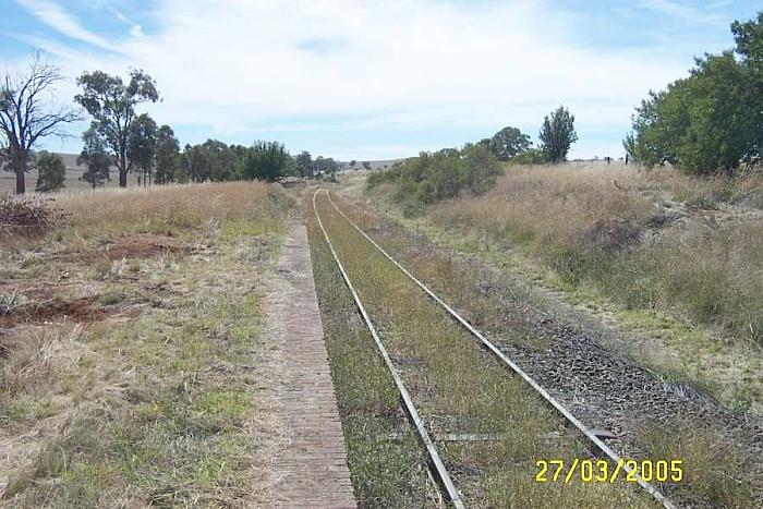 
The view looking north along the platform.  The one-time crossing loop on the
right has been lifted.
