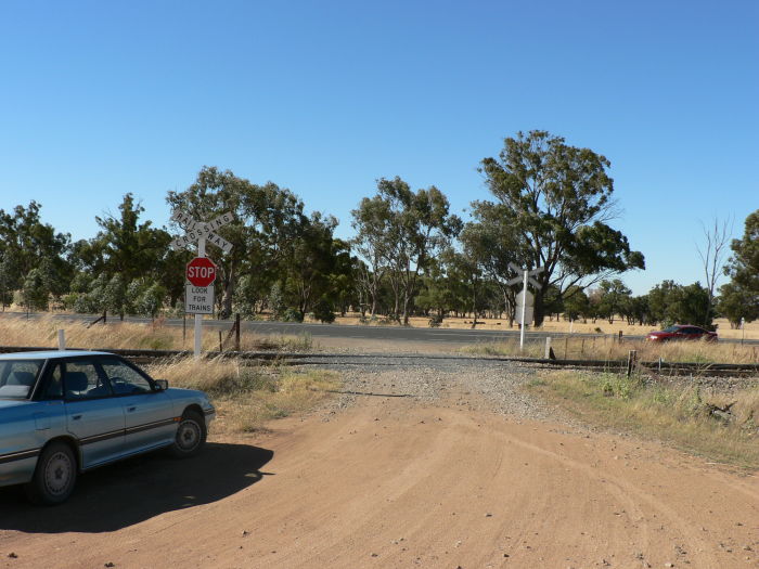 The crossing adjacent to the one-time location.